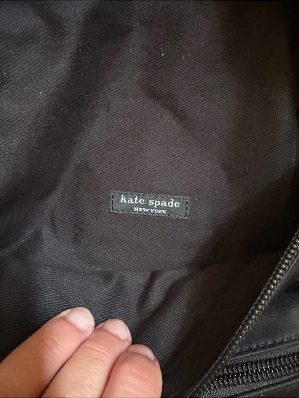 kate spade black nylon backpack with front zip pocket. Perfect condition!